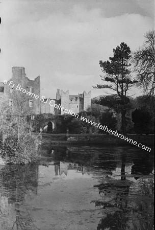 HOWTH CASTLE  LUTYEN'S TOWER (1911) AND STABLES FROM POND